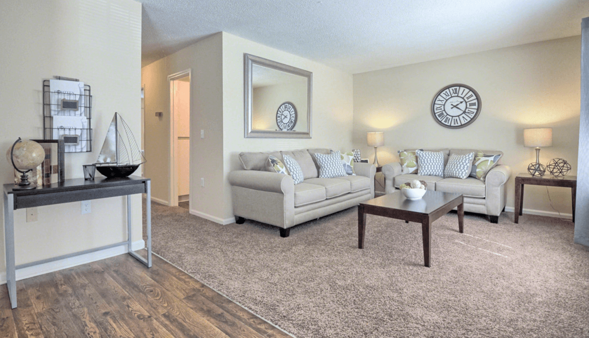 The living room of a home at The Retreat in the Hewitt Area offers a cozy hangout spot.