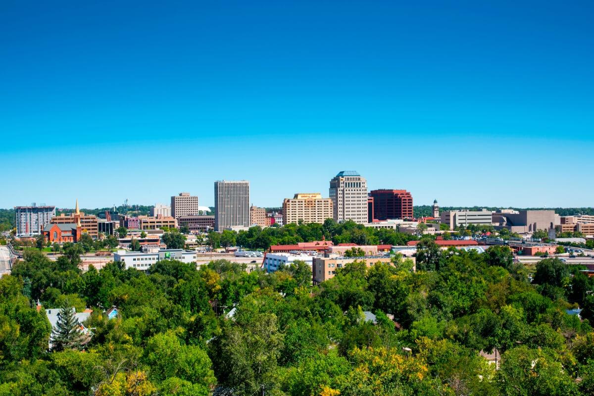 The Colorado Springs skyline on a clear afternoon.