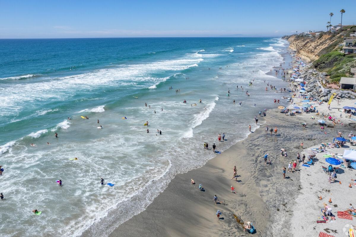 Waves crash onto the shore at Moonlight State Beach.