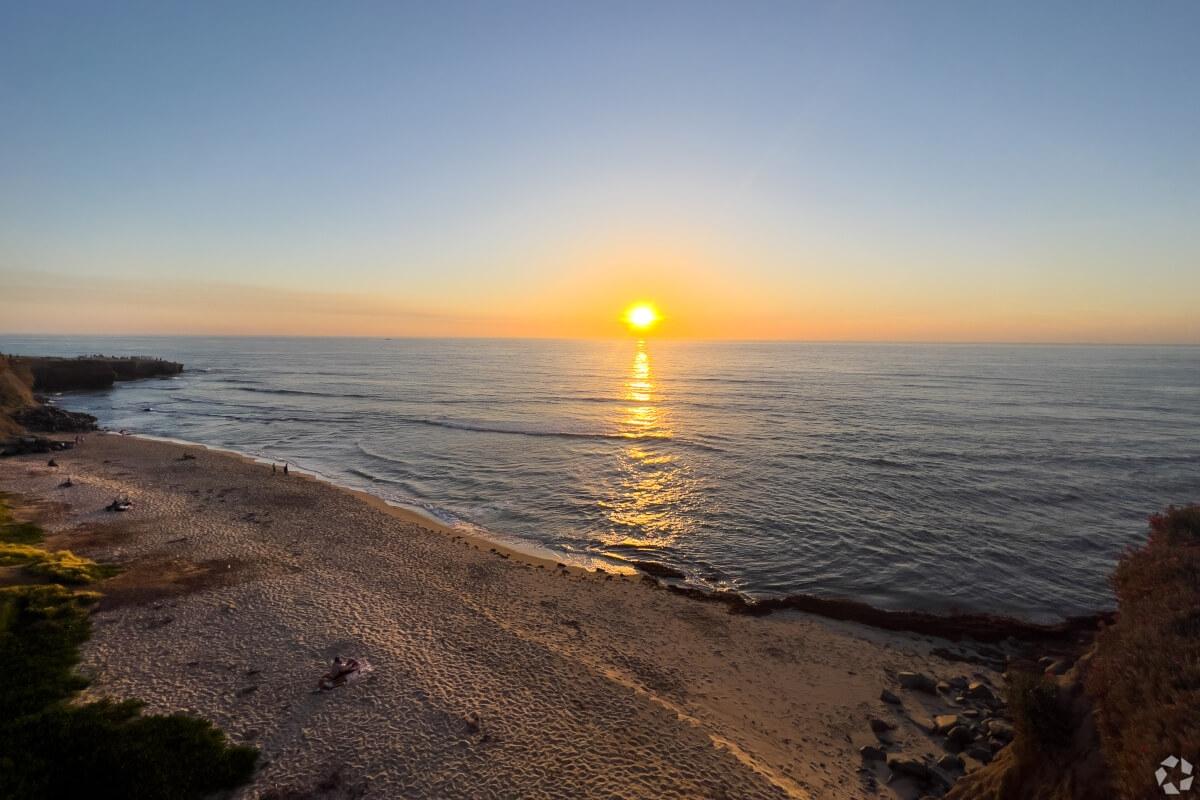 The sun reflects on the water at Sunset Cliffs Natural Park.