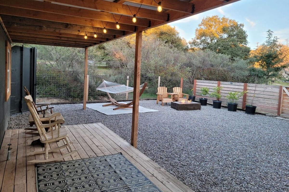 String lights hang over the patio area at 27221 Sawday Truck Trail.