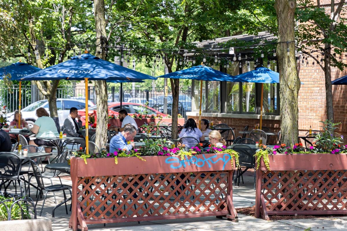 Tufano's Vernon Park Tap in Little Italy has al fresco dining that residents enjoy on sunny days.