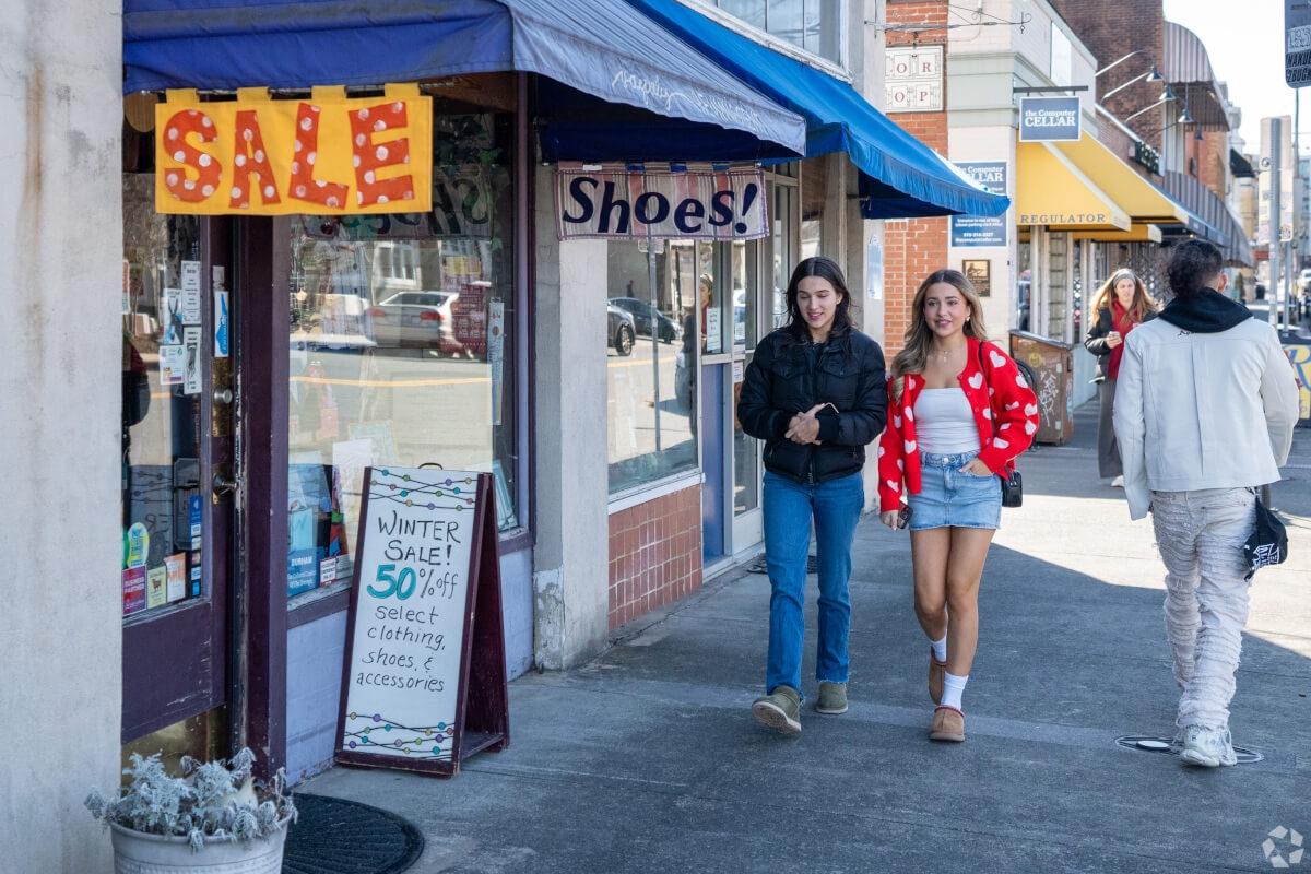 Residents walk around Durham.
