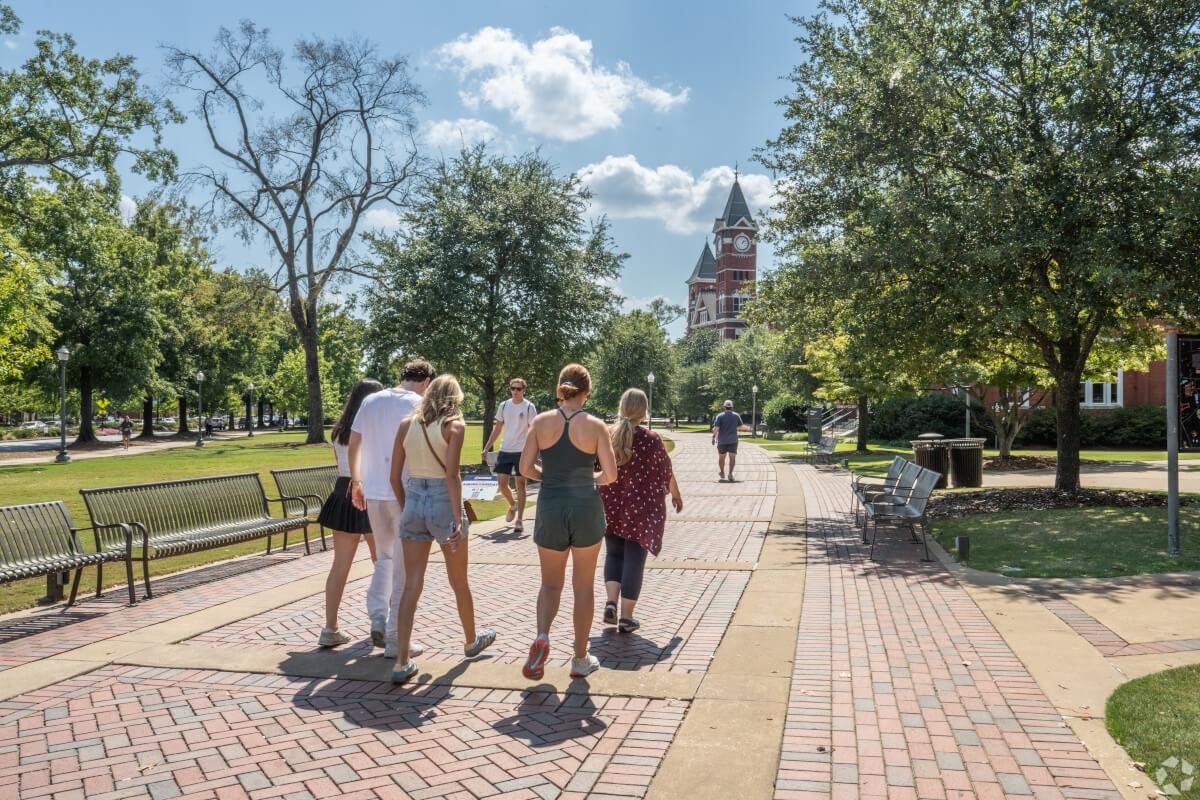 Auburn students walk around campus.