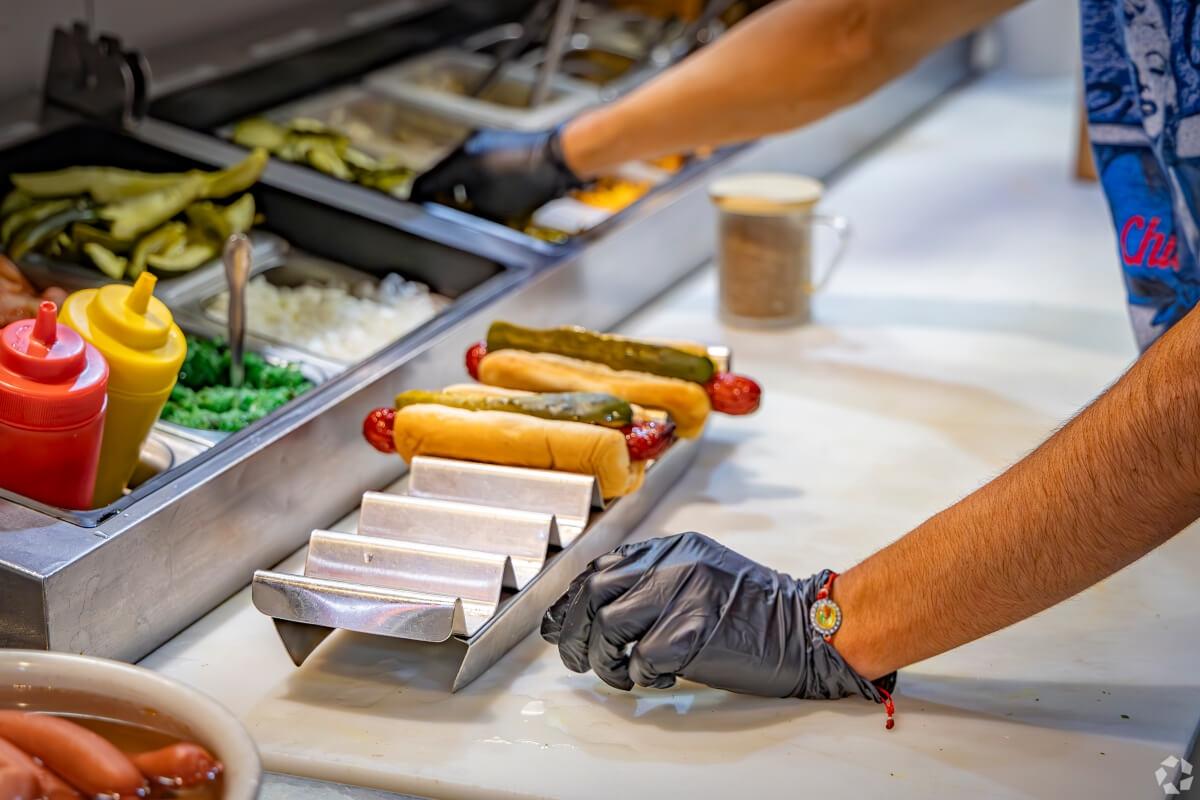 A close-up of Chicago-style hot dogs at Devil Dawgs.