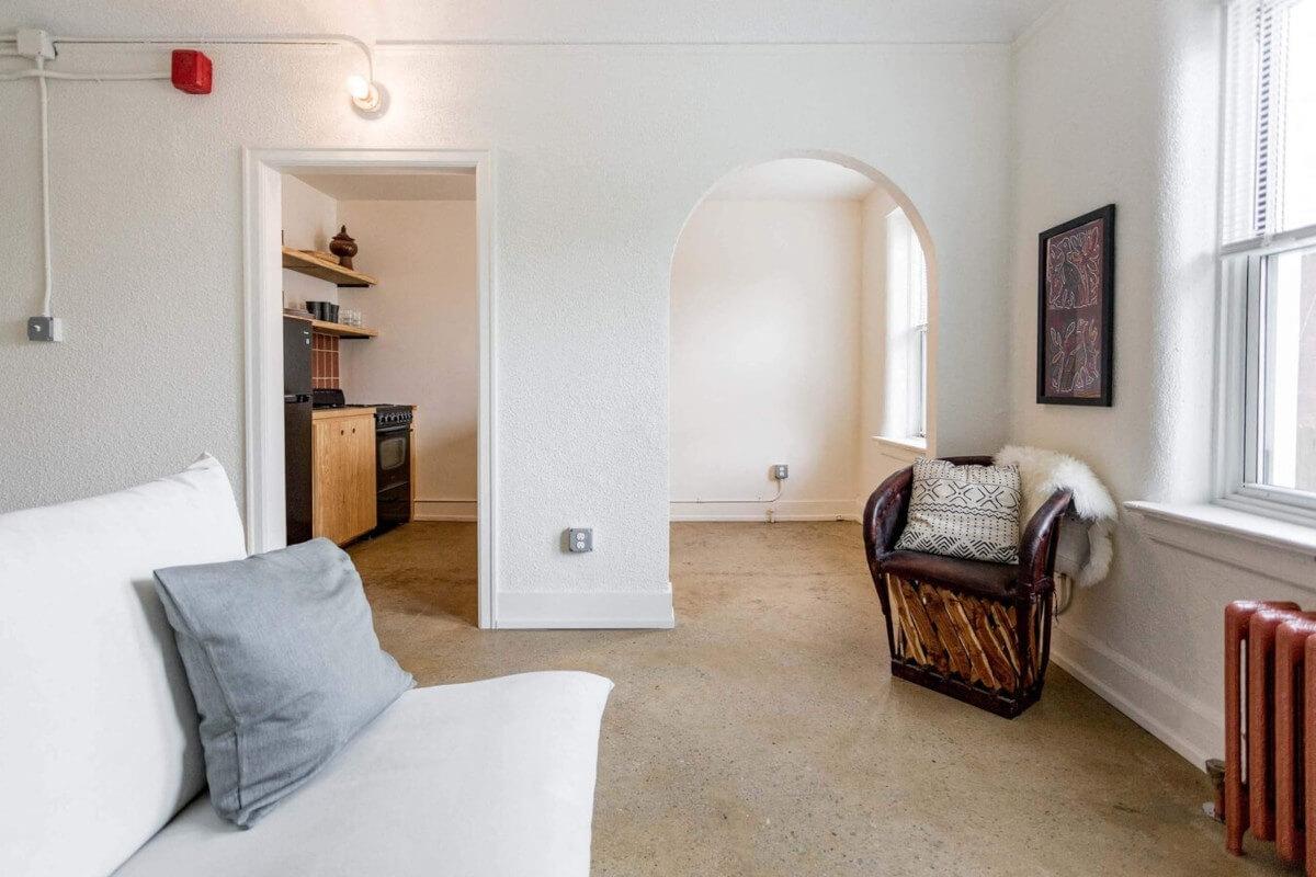 Units at The Barbara in Mexicantown have traditional and arched doorways.