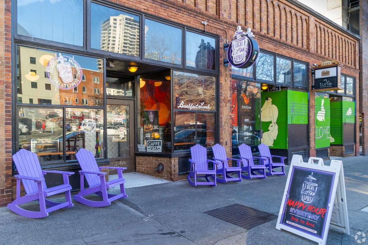 Purple Adirondack chairs outside of a coffee shop in Belltown.