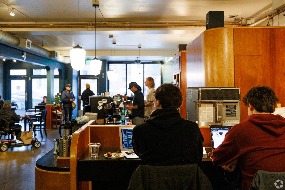 Patrons bring their laptops to Victrola Coffee to enjoy the ambiance while working.