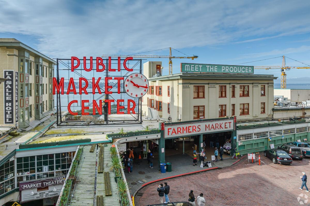 The iconic red market sign at the entrance to Pike Place Market.