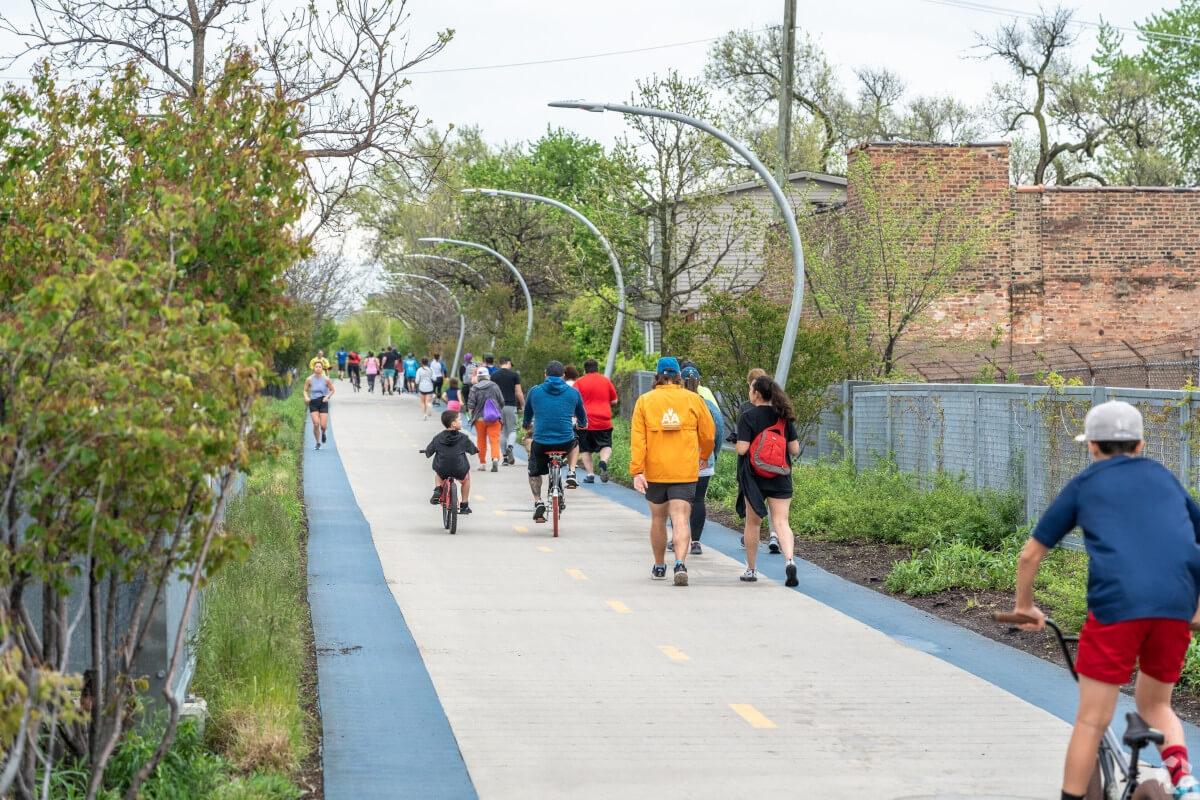 City goers walk in Logan Square.