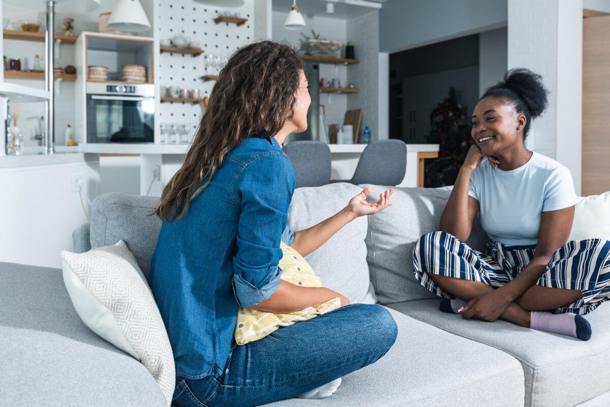 Roommates talking and having a good time with each other. 