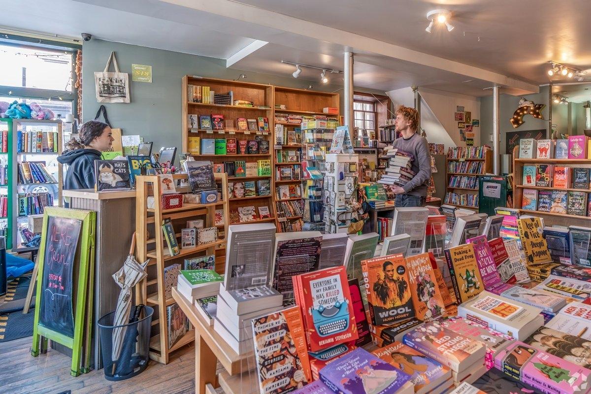 Independent bookstore in Greenpoint with colorful bookshelves, cozy seating, and a welcoming vibe for local apartment dwellers.