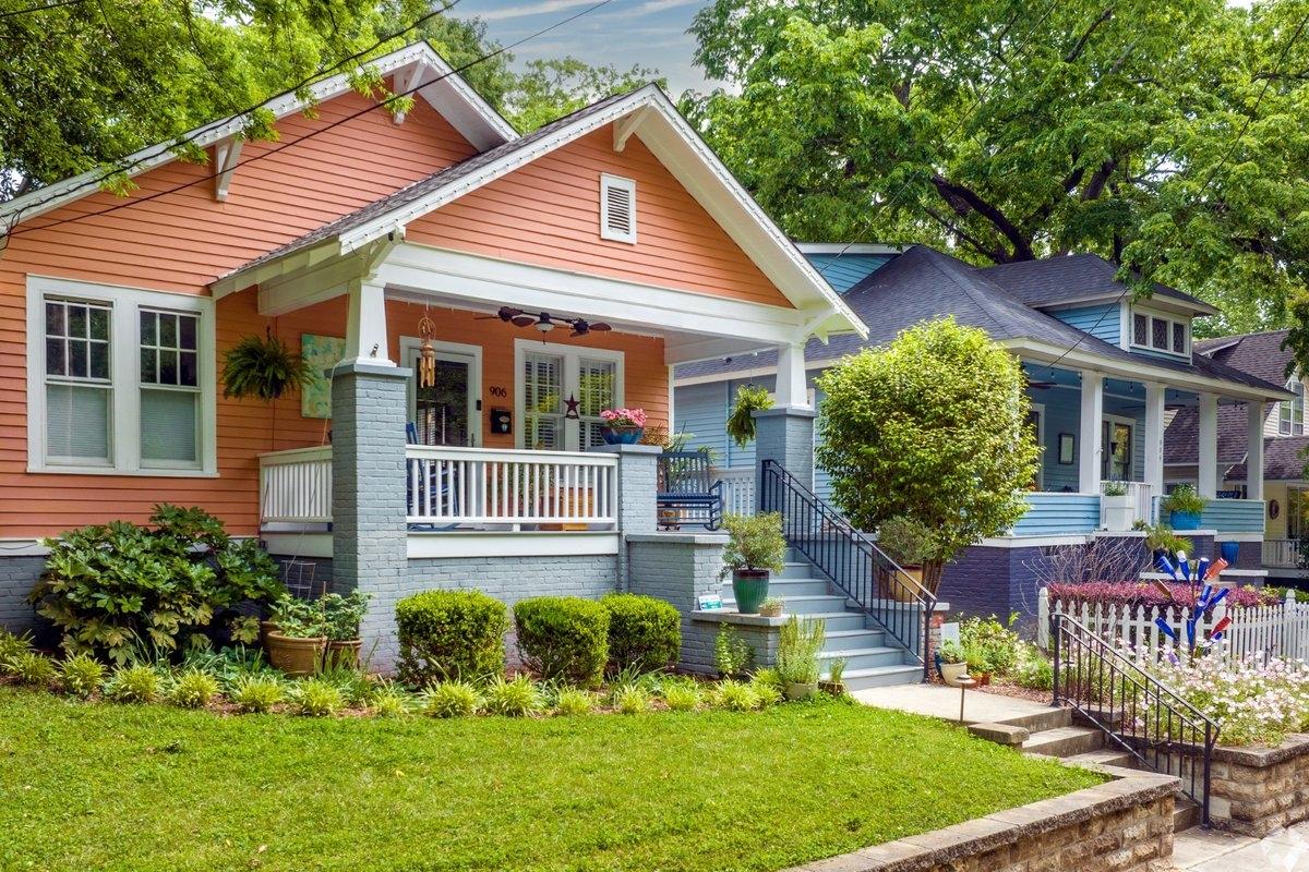 Pastel-colored homes on a neighborhood street