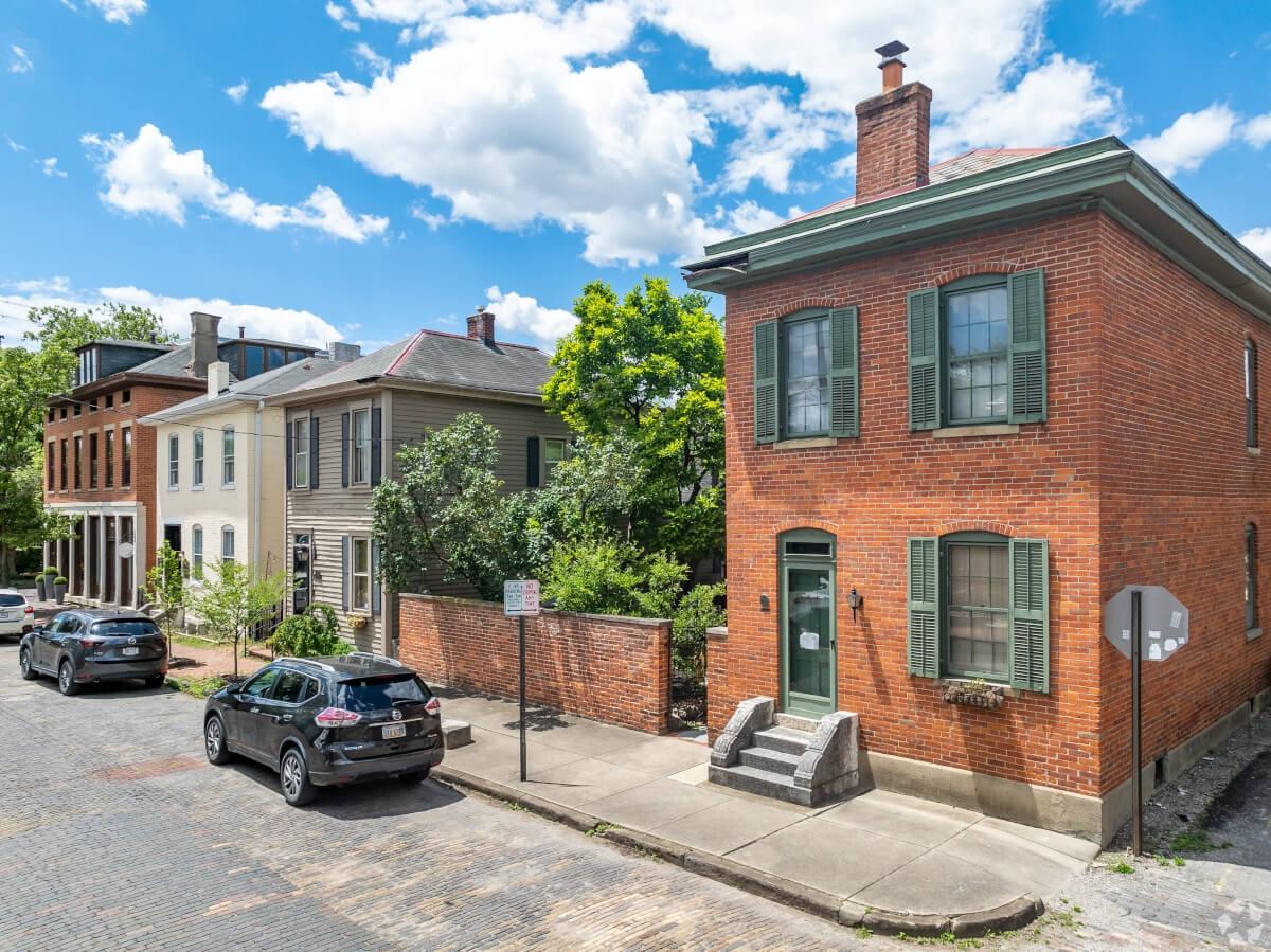 A street of brick homes in a Columbus, OH neighborhood