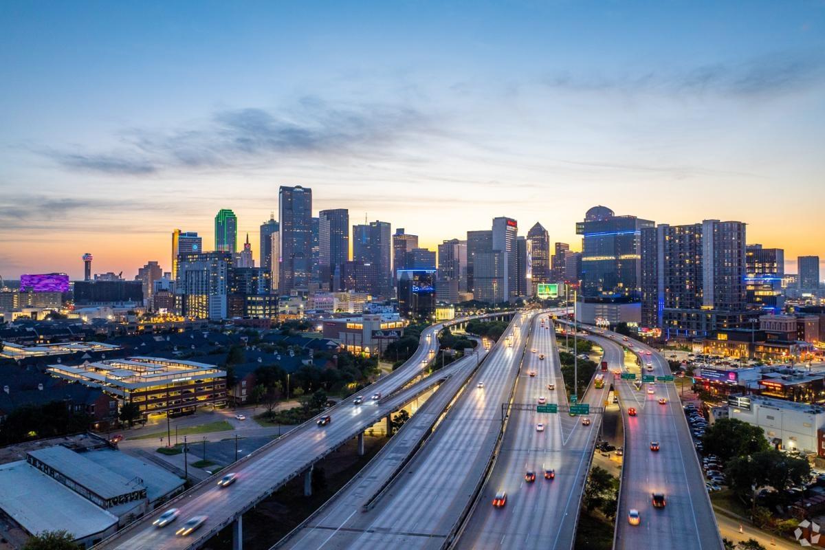 Sunset skyline of Downtown Dallas and the surrounding highways.