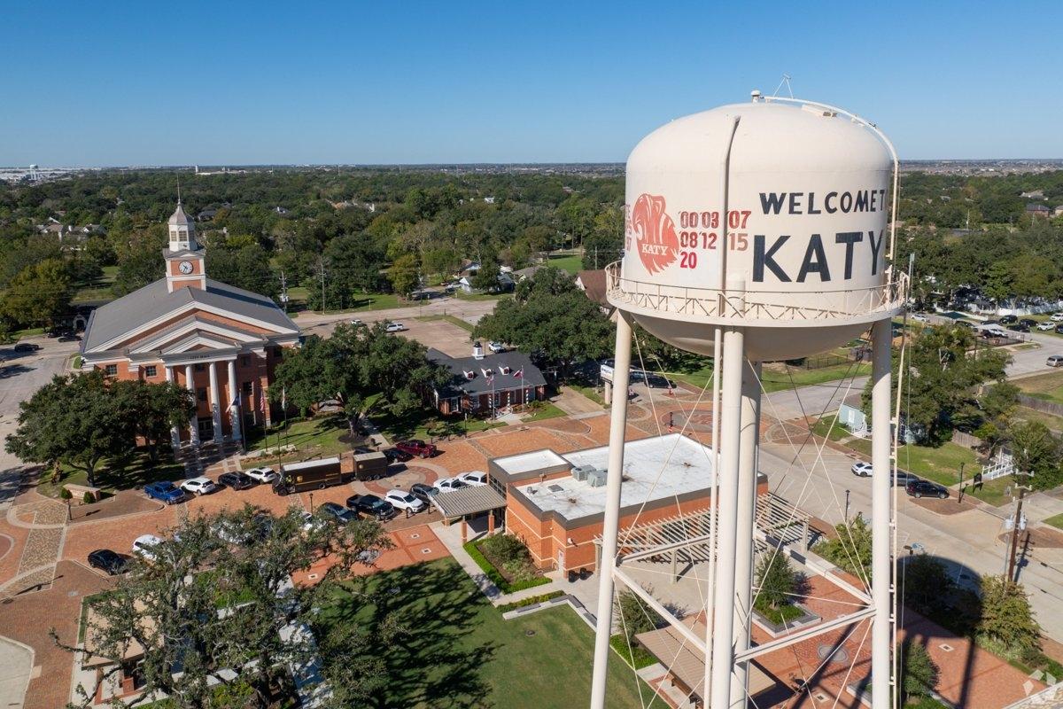 Aerial view of historic Katy TX water tower and city hall — ideal for apartment seekers looking for small-town charm near Houston.
