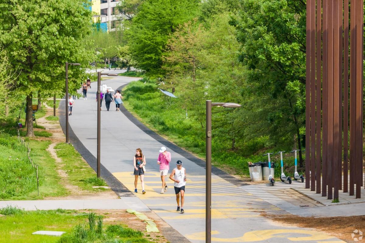 Pedestrians walk on the BeltLine in Old Fourth Ward.