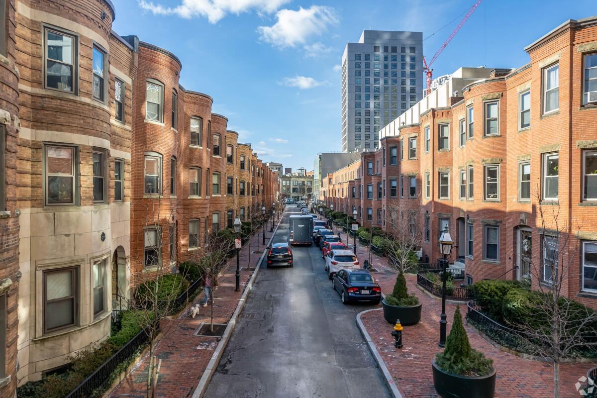 Cars parked on residential street in Boston.
