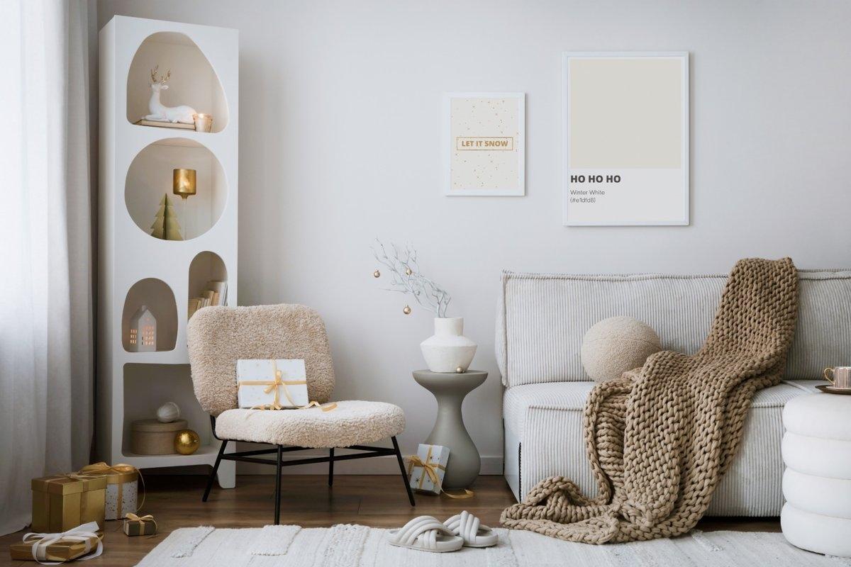 A cozy apartment living room with a rug, a blanket, and candles