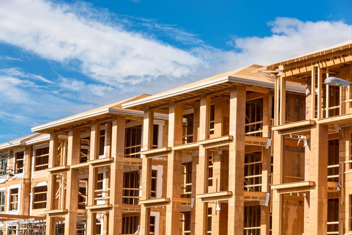 The wood frame of an apartment building under construction.