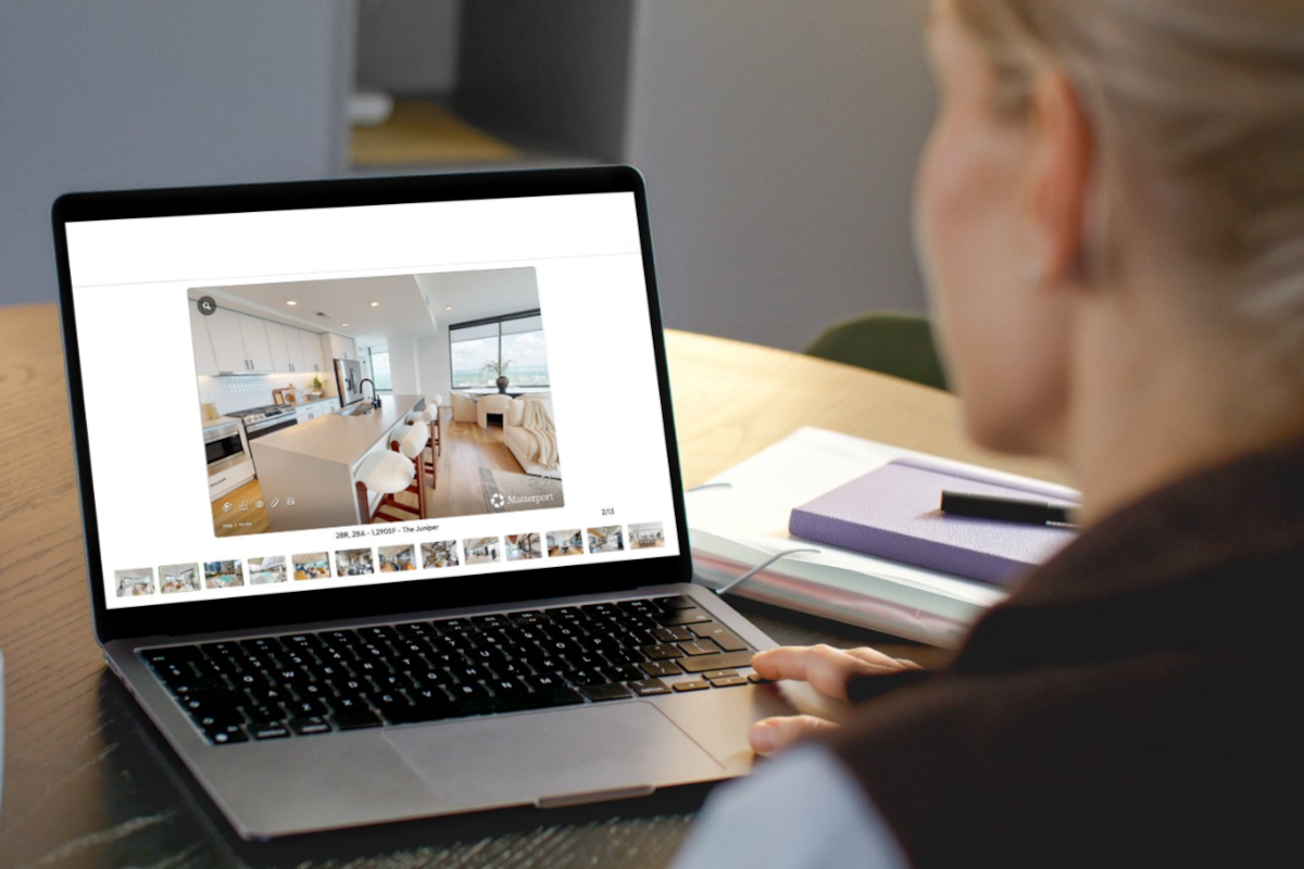 Renter explores a Matterport 3D tour on Apartments.com.