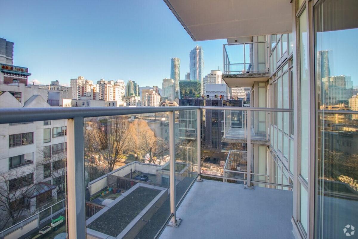 A private balcony at Wesley Place in West End Vancouver overlooks the city.