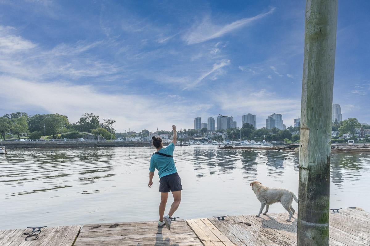 Locals enjoy time with their pets at Five Islands Park, which offers great views of downtown.
