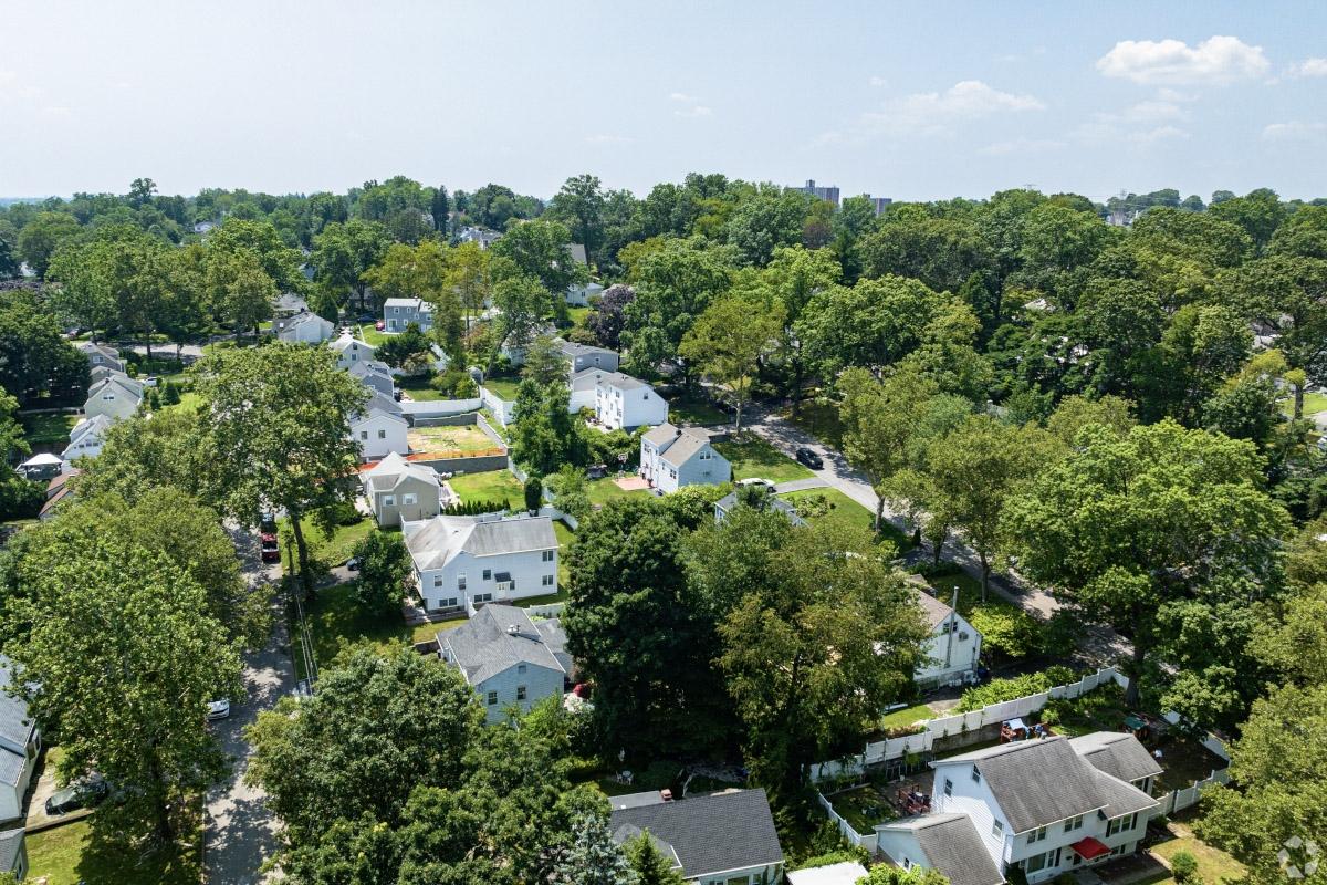 Single-family houses on tree-lined streets in Yonkers, NY.