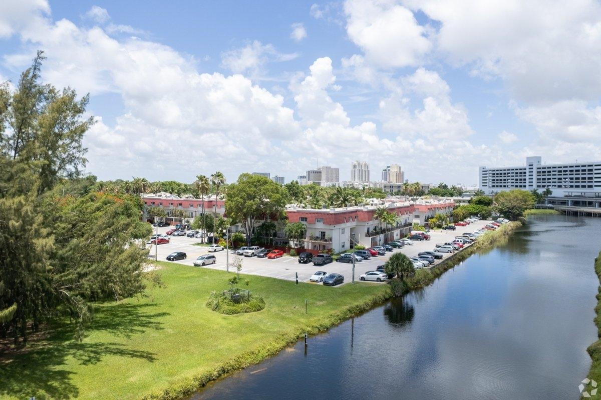A strip mall of stores in the Pinecrest neighborhood