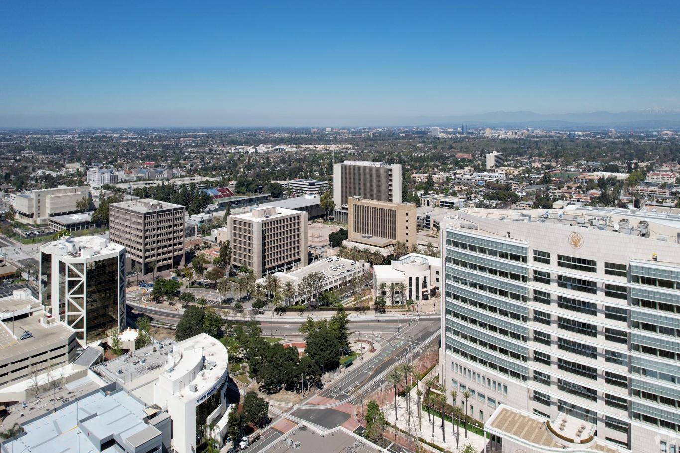 Santa Ana is flat but has some mid-rise buildings.