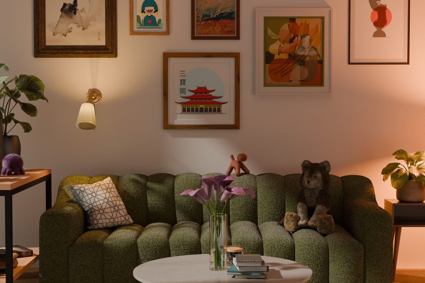 A room with a green couch. Overhead on the white wall there are multiple portraits and wall art. 