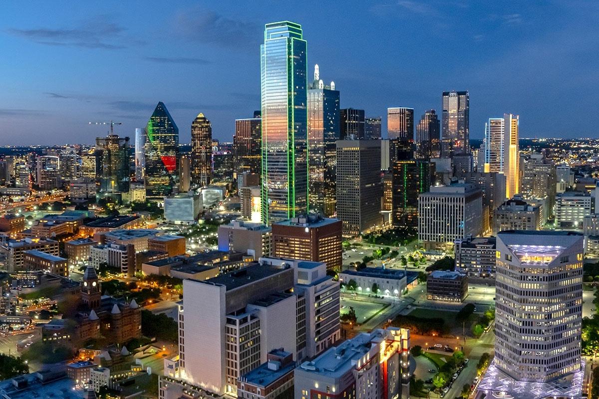 Dallas has many iconic buildings that light up during the evening and night.