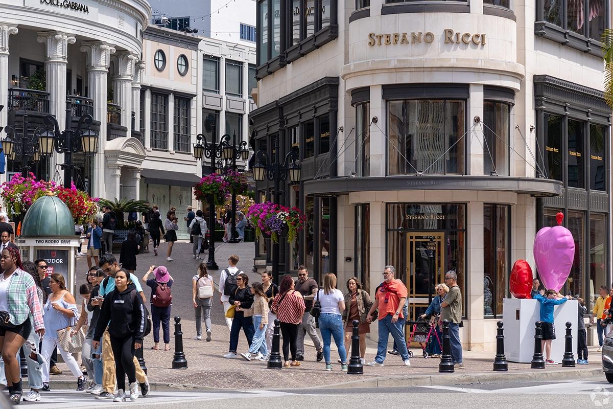 Tons of people walk on Rodeo Drive.