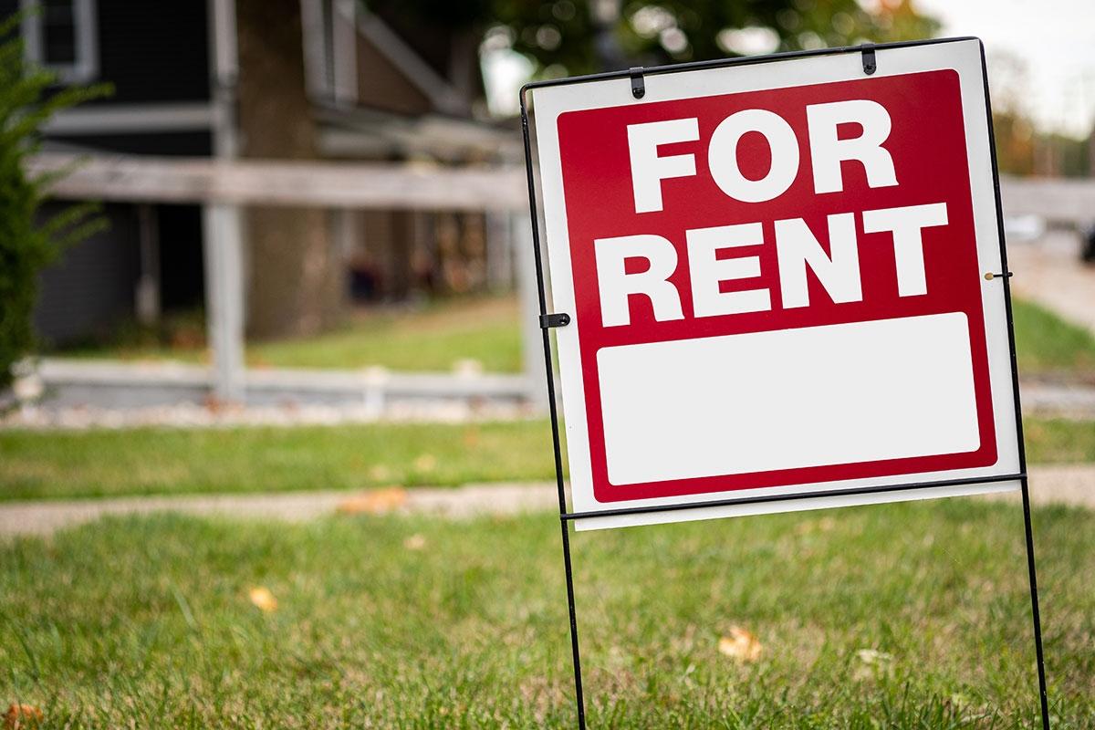 For rent sign in the ground