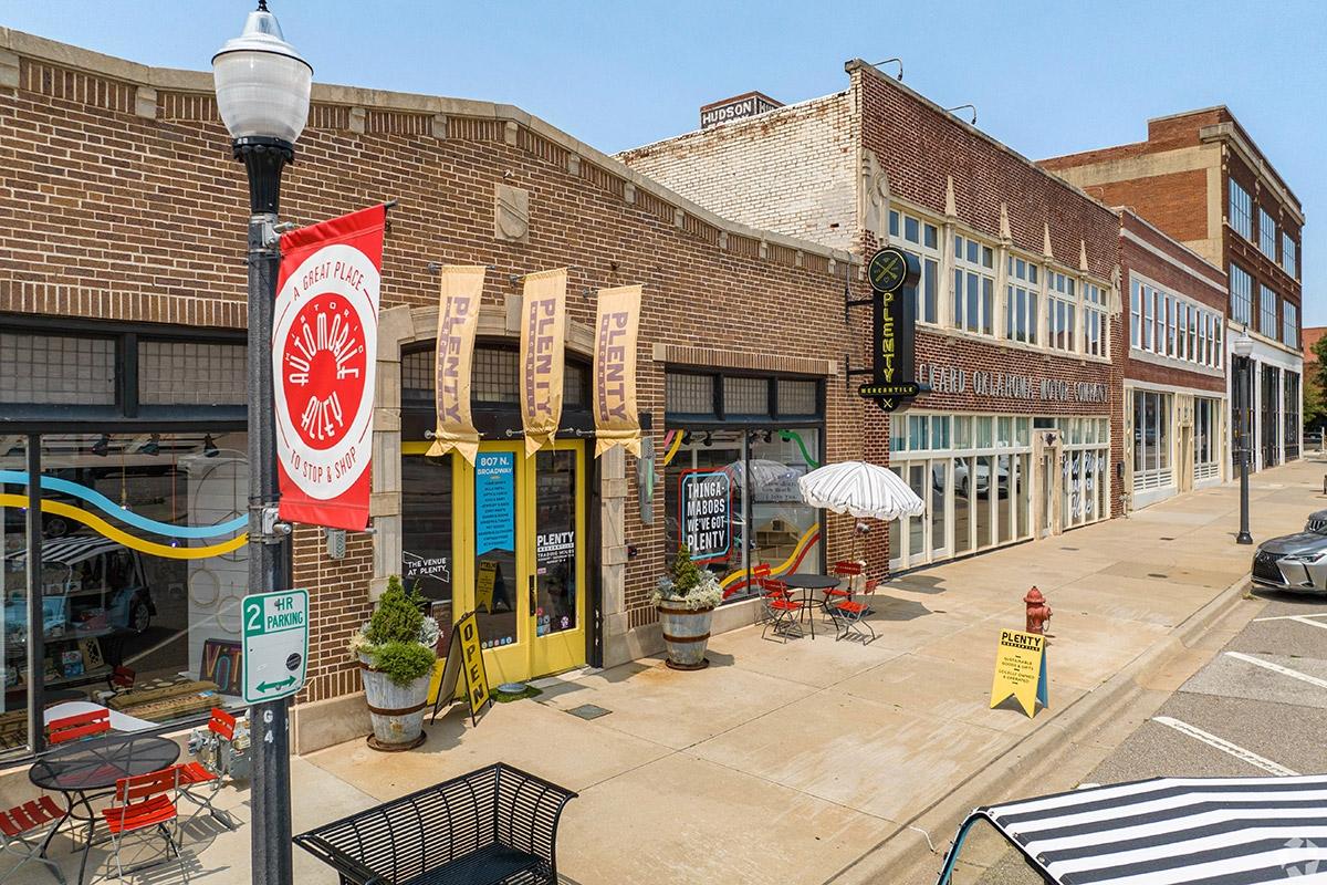 The main street of Automobile Alley contains local businesses in historic storefronts.