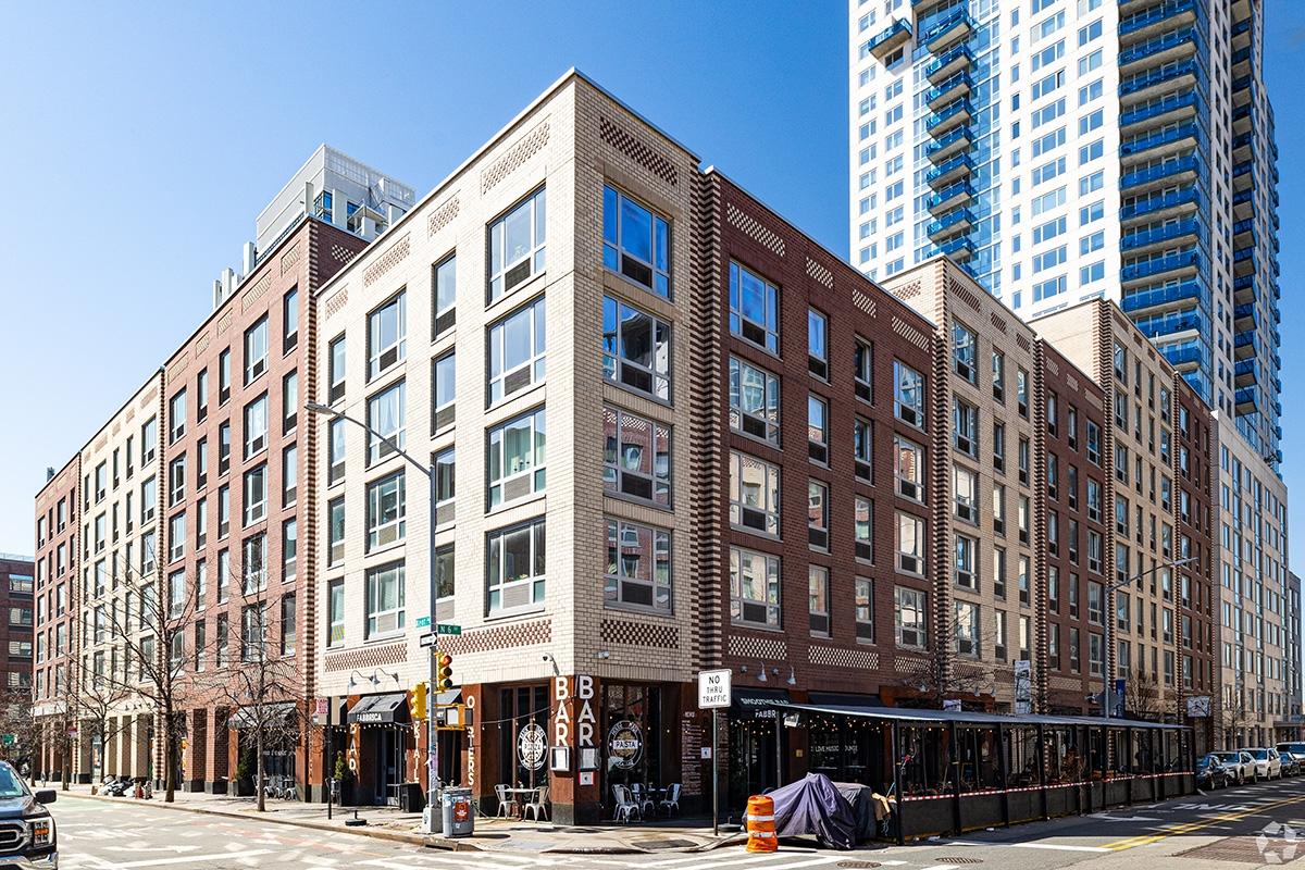 Apartments sit above restaurants and retail in NYC.