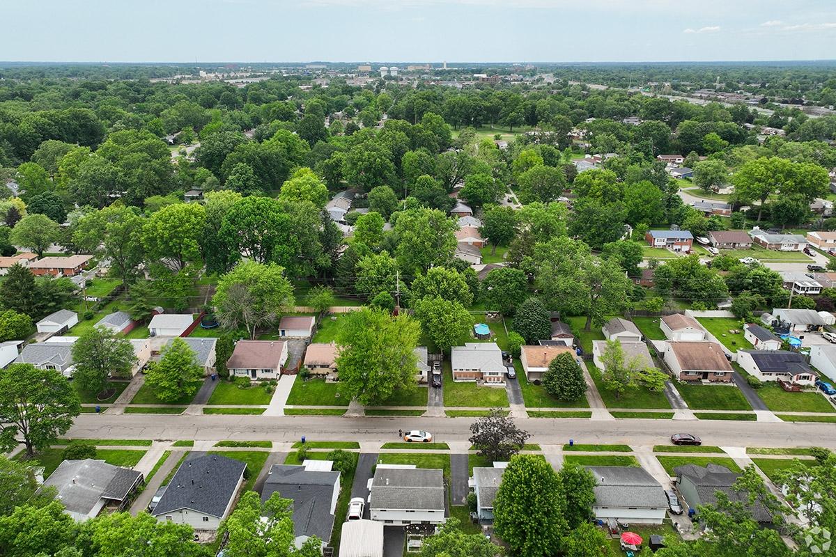 Salem Village is a neighborhood covered in trees, where homes have spacious lots.