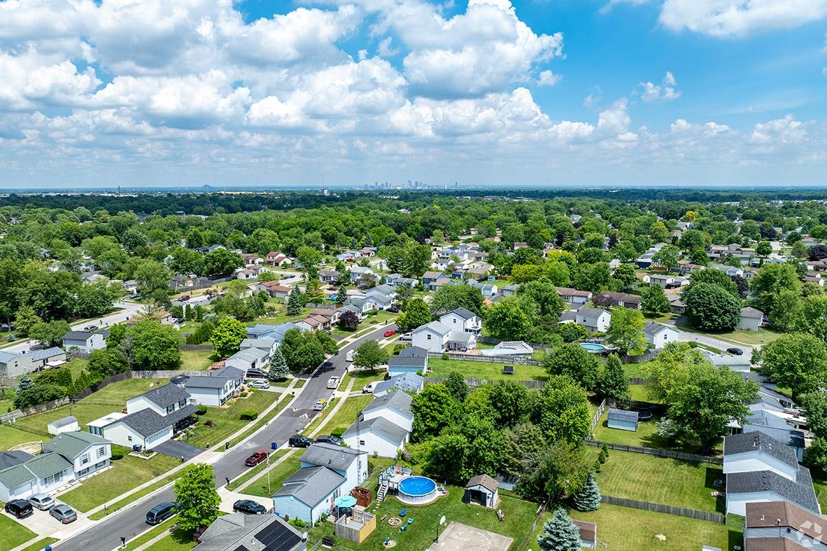 Cherry Creek is a tree-covered neighborhood where you can see Downtown Columbus in the distance.