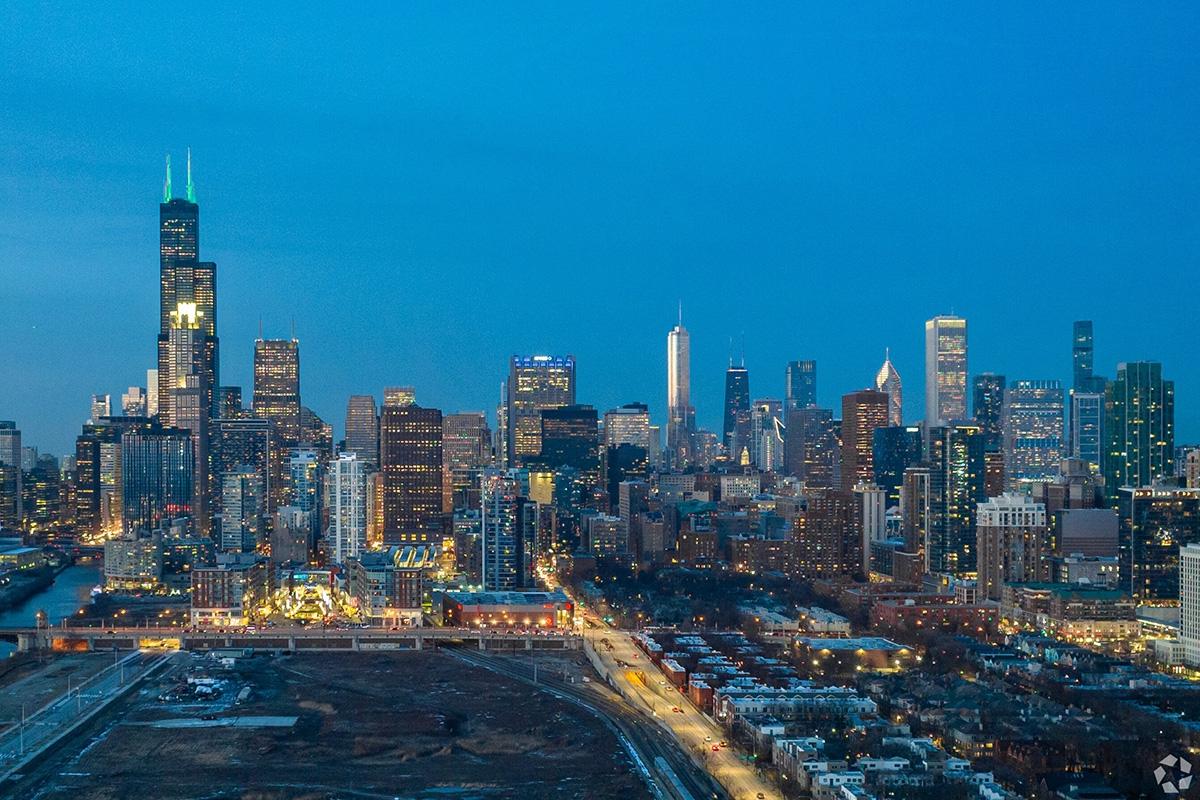 The Chicago skyline in the South Loop neighborhood at night.