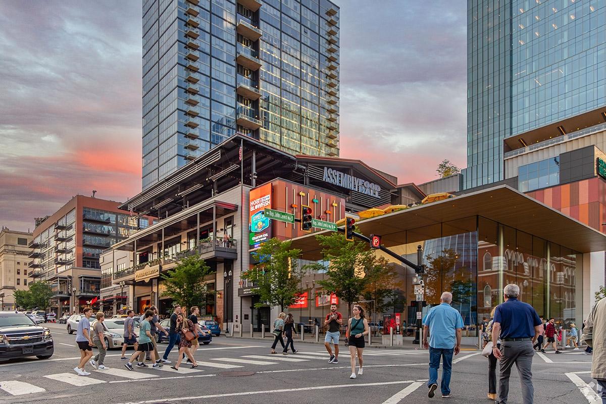 People walk around the busy part of Broadway Street in Downtown Nashville near the Assembly Food Hall.