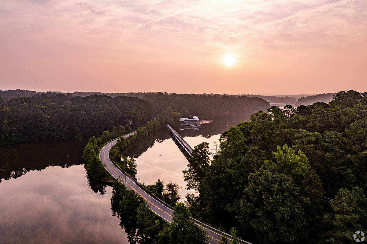 An aerial view of Lake Johnson in Raleigh at sunset.
