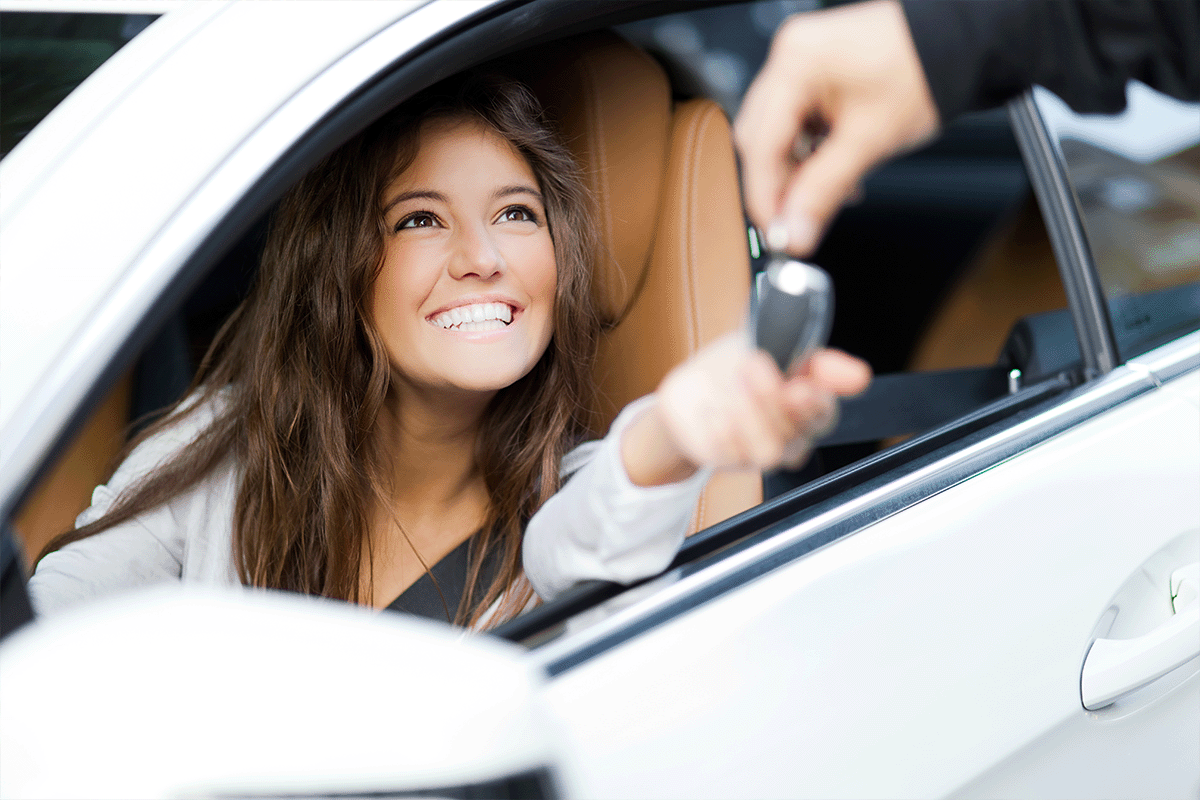 Person getting keys to a car