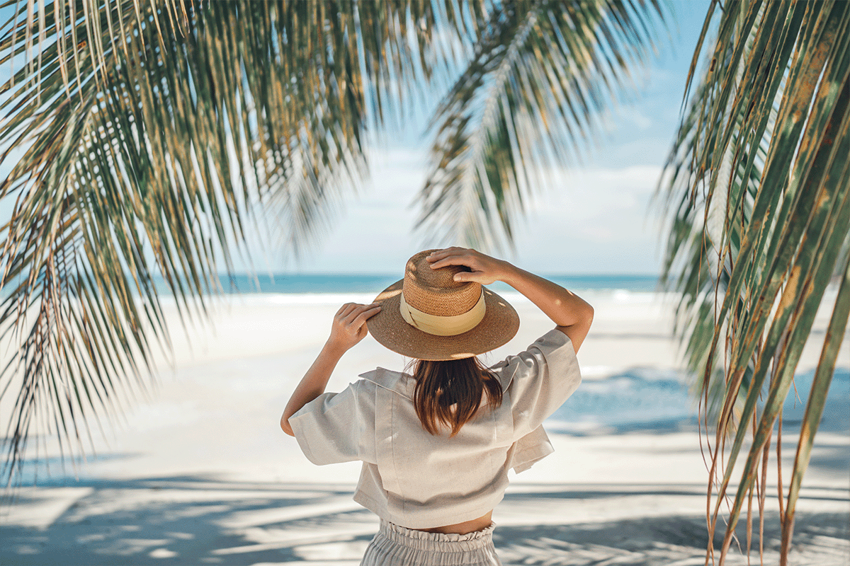 Person looking out at beach shore