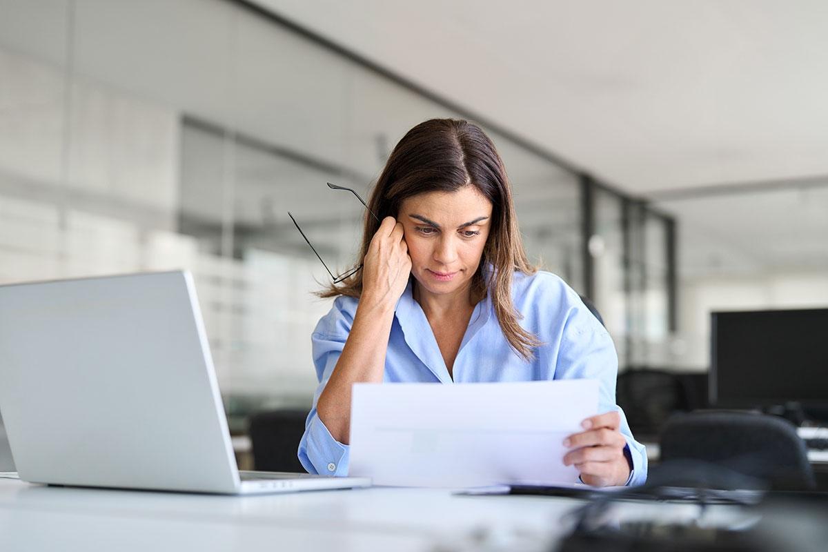 Renter looking at their returned security deposit that has deductions.