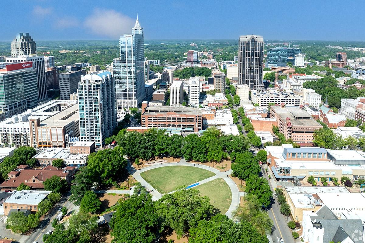Downtown Raleigh has a massive park surrounded by office buildings.