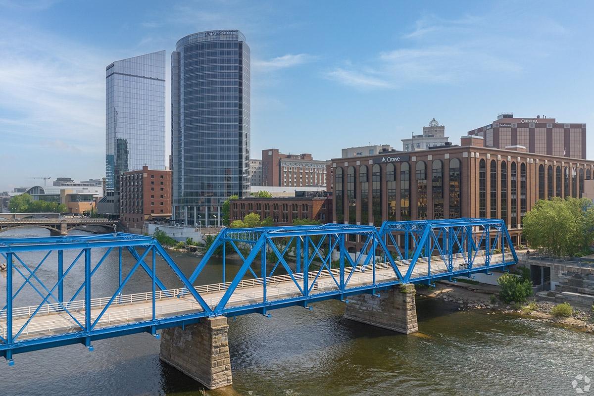 The iconic Blue Bridge leads into the many high-rises that make up Downtown Grand Rapids.
