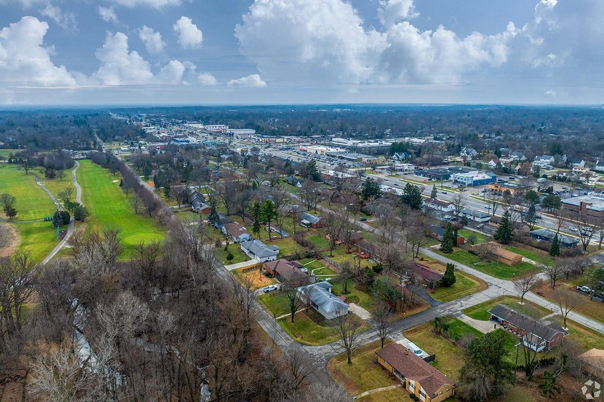 Farmington and Farmington Hills have commercial strips right next to tree-filled neighborhoods.
