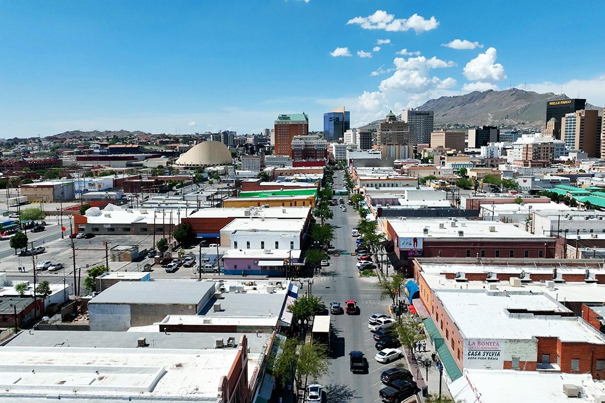 Local shopping streets lead to Downtown El Paso's taller buildings.