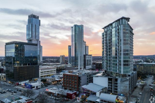 Sixth Street District in Austin at sunset.