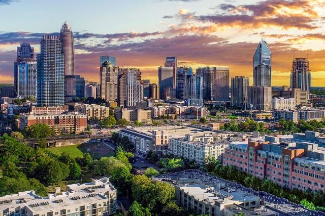 The skyline of Charlotte, NC at sunset.